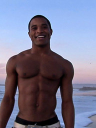 Ebony jock Landon shows his perfect abs and hard cock